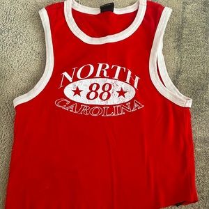 Super cute urban tank only worn a few times!! ❤️❤️ size small but does stretch